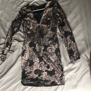 Sparkly black body con dress